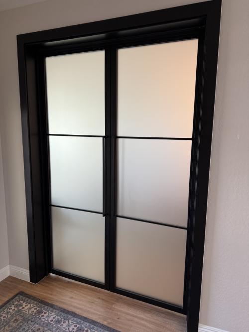 Iron door installation by Arizona Doors